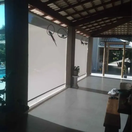 Toldo Cortina de Tela Screen em Atibaia SP — Cobertura em passagem coberta entre ambientes